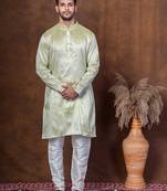 Green dupion kurta churidar set for men with solid print