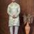 Green dupion kurta churidar set for men with solid print
