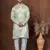 Green dupion kurta churidar set for men with solid print
