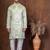 Green dupion kurta churidar set for men with solid print
