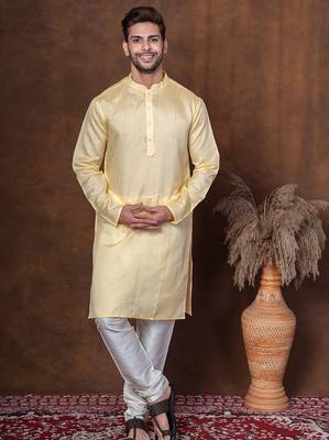 Yellow dupion kurta churidar set for men with solid print 1