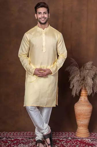 Yellow dupion kurta churidar set for men with solid print