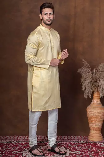 Yellow dupion kurta churidar set for men with solid print
