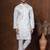 Off white dupion kurta churidar set for men with solid print
