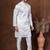 Off white dupion kurta churidar set for men with solid print