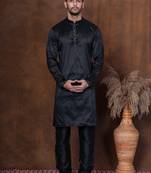 Black dupion kurta churidar set for men with solid print