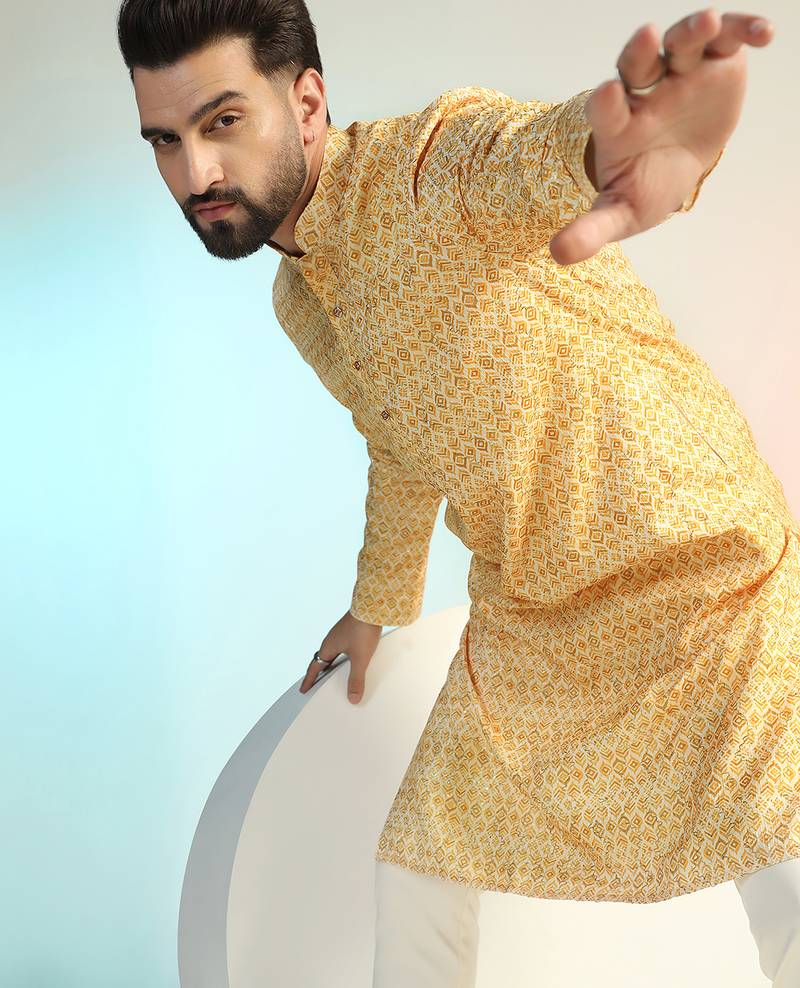 Yellow cotton blend kurta for men with printed design