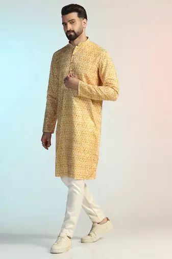 Yellow cotton blend kurta for men with printed design