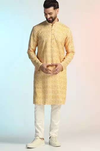 Yellow cotton blend kurta pajama set for men with printed design