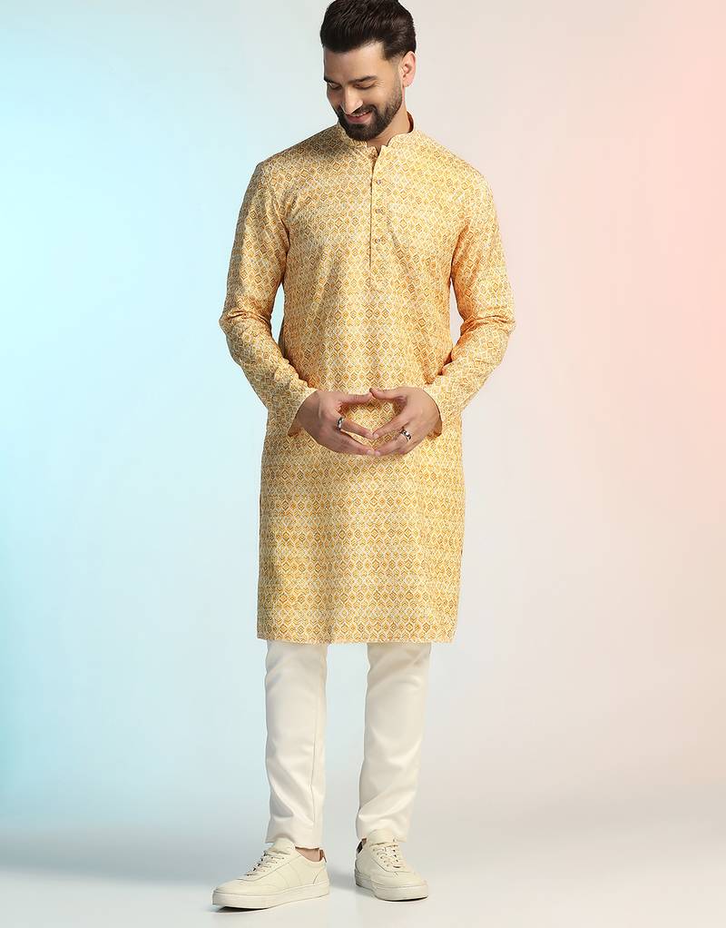 Yellow cotton blend kurta pajama set for men with printed design