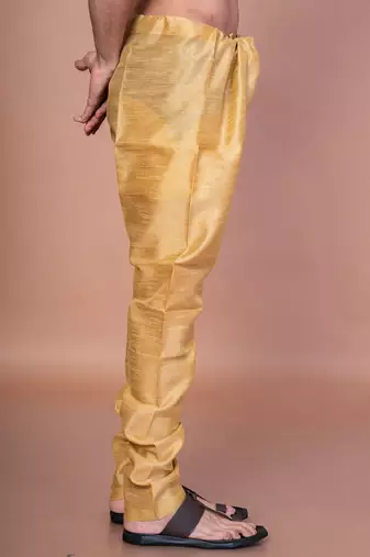 Gold banarasi silk churidar for men with solid design
