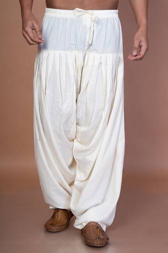 Cream cotton patiala for men with solid design