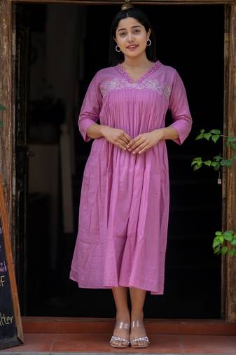Pink Cotton kurti designed with floral embroidery