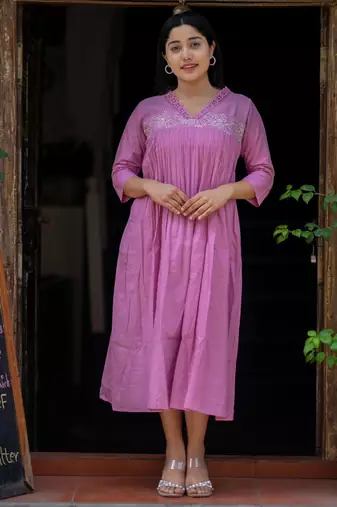 Pink Cotton kurti designed with floral embroidery