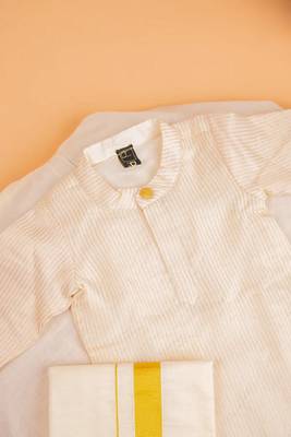 Cream tissue plain thamburan kutti kurta with mundu for boys 2