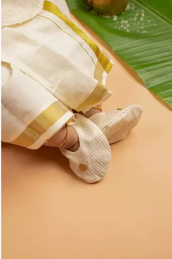 Cream tissue plain thamburan kutti kurta with mundu for boys