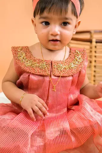 Orange tissue embroidered gulal frock for girls