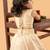 Beige tissue printed ruhani frock for girls