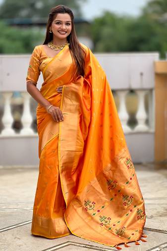 Orange silk blend saree with paithani rich weaved pallu and blouse