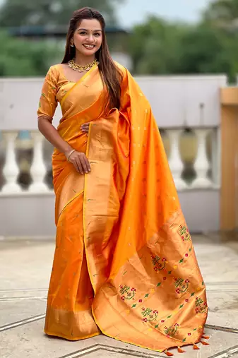Orange silk blend saree with paithani rich weaved pallu and blouse