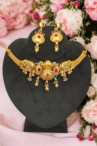 Traditional kalash design gold plated choker necklace set with earrings – temple jewlery style with elephant motif.