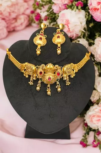 Traditional kalash design gold plated choker necklace set with earrings – temple jewlery style with elephant motif.