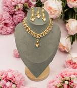 Kundan choker necklace set with earrings and mang tikka | pearl beaded bridal jewelry for women & girls.