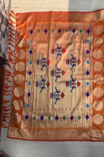 orange color faux banarasi silk blend saree with paithani rich weaved pallu and blouse
