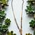 Elegant gold-plated sunflower pendant mangalsutra for women – traditional ad stone jewelry with black beads"