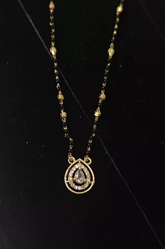 Gold plated ad mangalsutra with teardrop pendant for women | traditional black beads necklace