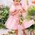 Baby pink organza woven twinkle frock for girls