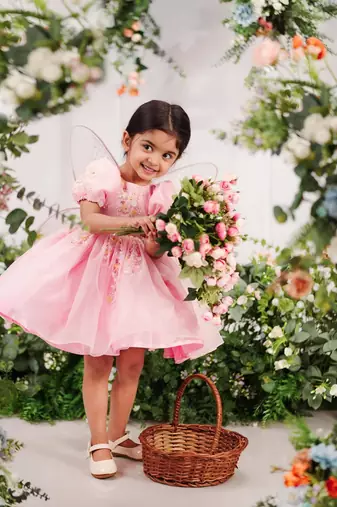 Baby pink organza woven twinkle frock for girls
