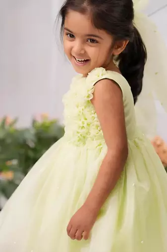 Light green organza woven daffodil frock for girls