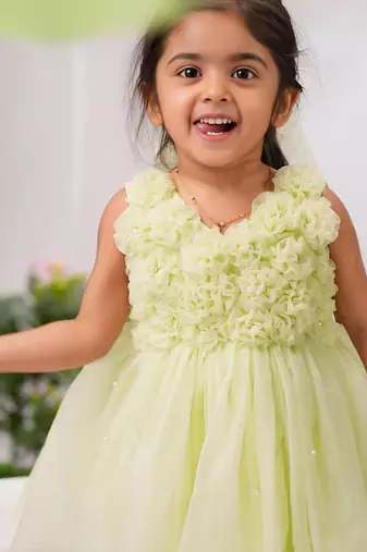 Light green organza woven daffodil frock for girls