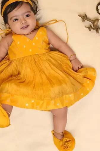 Yellow tissue printed sitara frock for girls