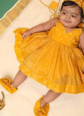 Yellow tissue printed sitara frock for girls 4