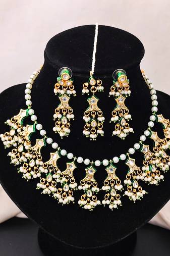 Beautiful kundan pearl and green pearls necklace set with maang tikka & earrings