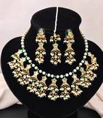 Beautiful kundan pearl and green pearls necklace set with maang tikka & earrings