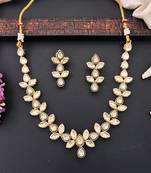 Elegant floral polki kundan necklace set with earrings