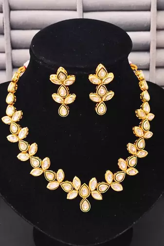 Elegant floral polki kundan necklace set with earrings