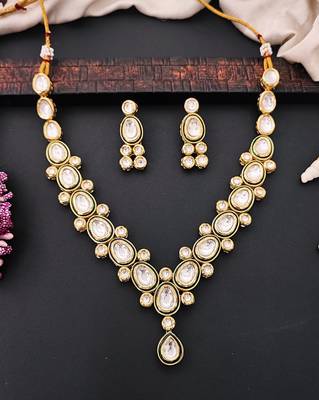 Classic oval polki kundan green enamel necklace set with matching earrings 1