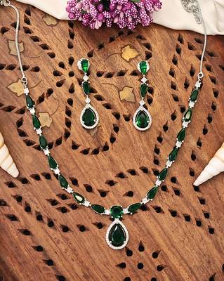 Delicate emerald green stone necklace set with matching drop earrings 1