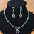 Delicate emerald green stone necklace set with matching drop earrings