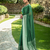 Green georgette saree with intricate jacquard and blouse
