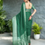 Green georgette saree with intricate jacquard and blouse