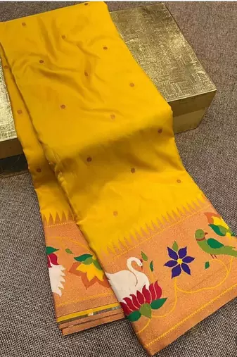yellow banarasi silk blend saree with paithani weaved pallu and blouse