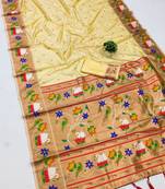 cream banarasi silk blend saree with paithani weaved pallu and blouse