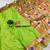 parrot green banarasi silk blend saree with paithani weaved pallu and blouse