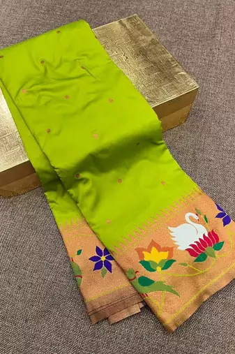 parrot green banarasi silk blend saree with paithani weaved pallu and blouse