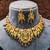 Antique gold-plated temple necklace set with lakshmi & peacock design – traditional bridal jewellery